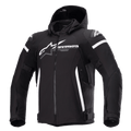 Alpinestars Zaca Waterproof Jacket, Black motorcycle jacket with detachable hood, large white Alpinestars logo on chest, white stripes on upper arms and vertical side accents, front zipper, reinforced shoulder padding, adjustable straps on waist and arms, textile softshell construction