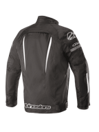 Alpinestars Gunner V2 Waterproof Jacket, Back View, Black and White, textile construction with vertical white accents, large Alpinestars logo on the lower back and A-star logo on the shoulder, urban riding gear