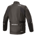 Alpinestars Andes V3 Drystar® Jacket, Motorcycle Jacket, Black, back view featuring a large lower utility pocket with Alpinestars branding, reflective accents on shoulders, and adjustable waist belt, durable textile design for adventure touring