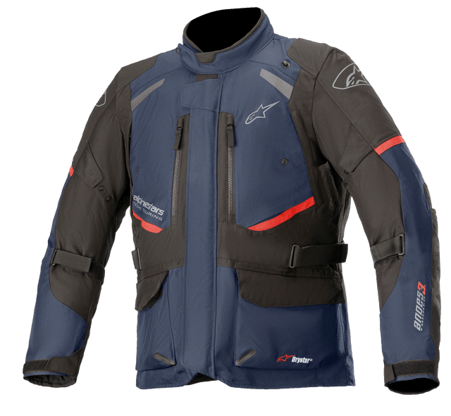 A Dark Blue/Black motorcycle jacket from Alpinestars EU featuring abrasion-resistant padding on the shoulders and elbows. The jacket includes adjustable straps on the sleeves and waist, zipped vents on the chest, multiple pockets, and visible branding. Inspired by the Andes V3 Drystar® Jacket, it also offers 100% waterproofing.