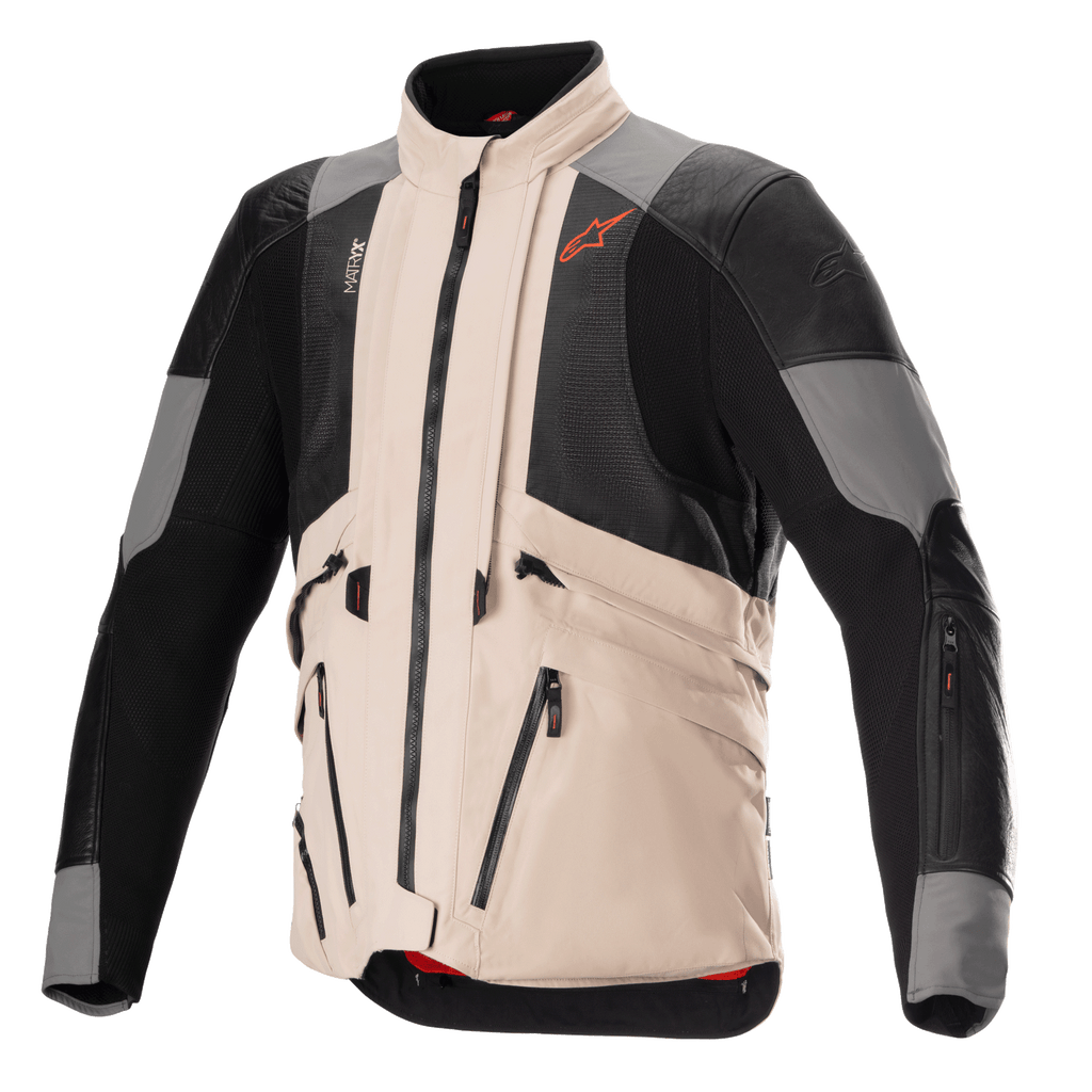 Alpinestars AMT-10R Drystar XF Jacket in heat configuration, Adventure Motorcycle Jacket, Fur Gray and Pale Brown with Black mesh panels, modular design for maximum airflow, featuring multiple utility pockets and Spicy Orange Alpinestars logo on the chest.