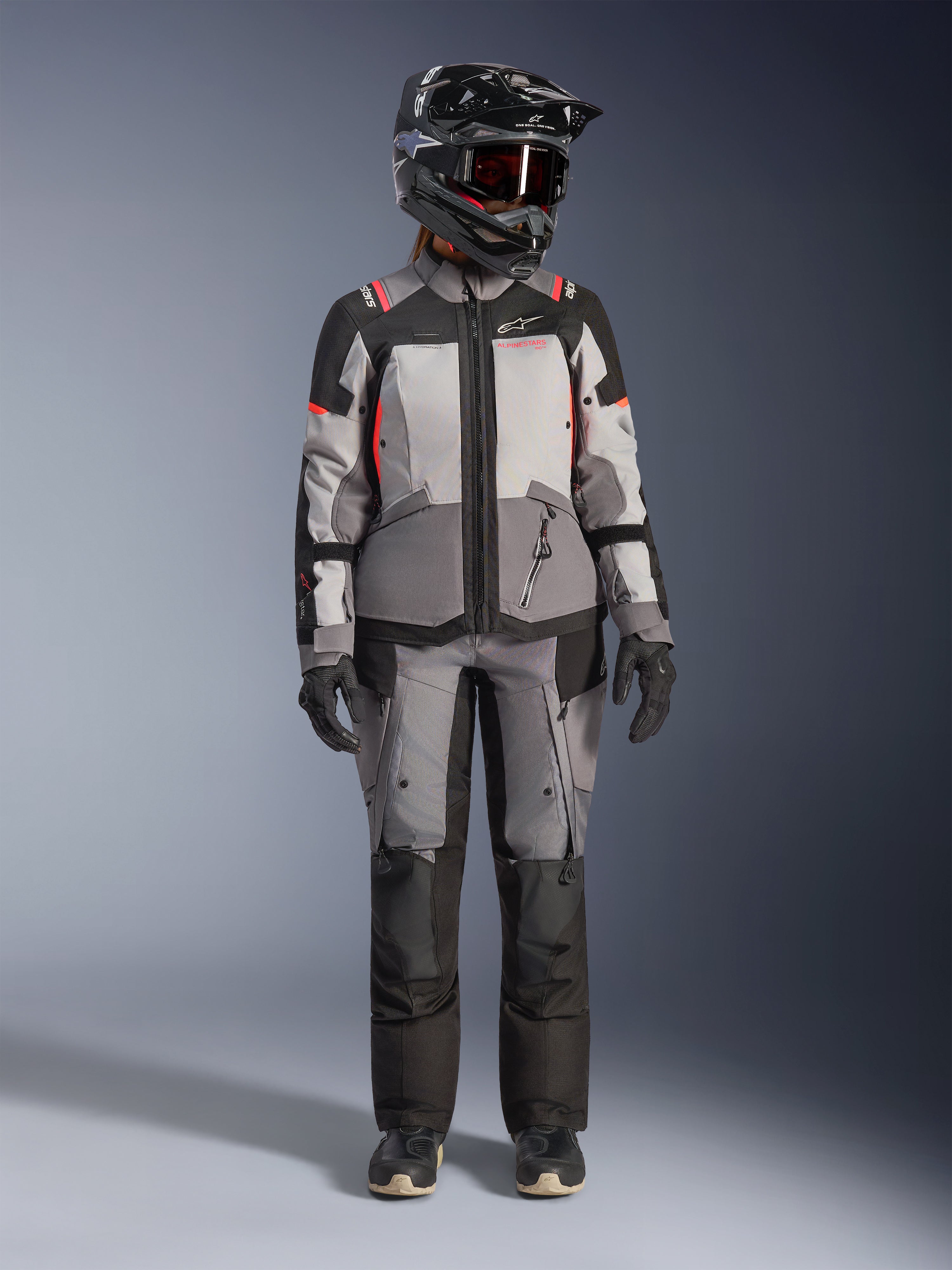 Alpinestars Stella Andes V4 Drystar® Jacket, gray and coral fluo textile women's adventure gear with matching pants.