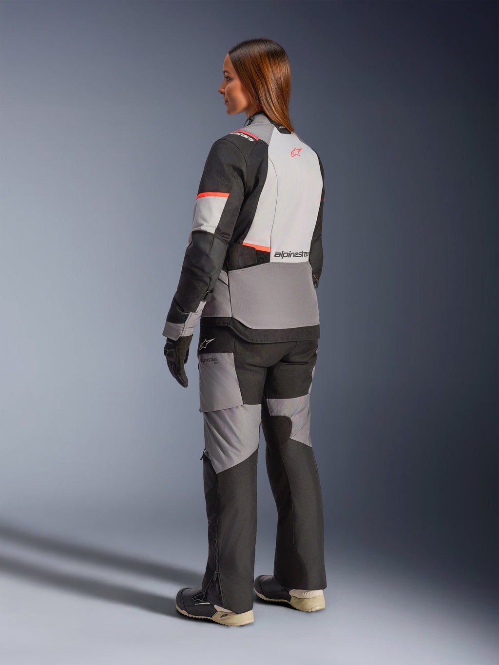 Alpinestars Stella Andes V4 Drystar Jacket, Women's gray/black waterproof adventure jacket with coral accents, rear view.