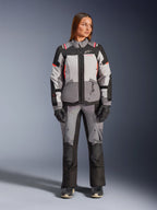 Alpinestars Stella Andes V4 Drystar® Jacket, women's adventure textile gear in gray and black with coral fluo accents.