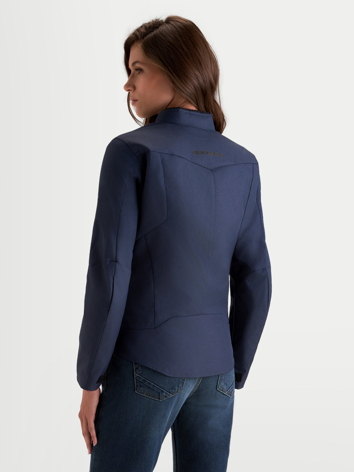 Alpinestars Stella C-1 Waterproof Jacket, women's urban motorcycle jacket in mood indigo blue, rear view showing 3D back construction and soft inner collar worn by a model.