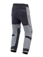 Alpinestars Andes Pro Drystar® XF Pants, Adventure Motorcycle Pants, Dark Gray and Black, rear view featuring adjustable calf straps, Alpinestars branding, and waterproof zippered details