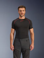 Alpinestars Cusco Drystar® Pants, Adventure Motorcycle Pants, Black, technical textile construction with zippered ventilation and ripstop panels, worn by a male model with a black Alpinestars base layer shirt for a complete adventure riding look