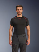 Alpinestars Cusco Drystar® Pants, Adventure Motorcycle Pants, Black, technical textile construction with zippered ventilation and ripstop panels, worn by a male model with a black Alpinestars base layer shirt for a complete adventure riding look