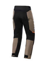Alpinestars Cusco Drystar® Pants, Adventure Motorcycle Pants, Walnut Brown and Black, back view featuring black stretch panels, orange accents, zippered vents, and adjustable velcro cuffs for road riding.