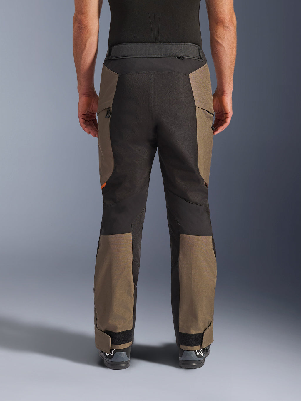 Alpinestars Cusco Drystar® Pants, Adventure Motorcycle Pants, Walnut Black, rear view on model, durable textile construction with color-blocked panels, adjustable hem, and zippered waist detail for touring and adventure riding