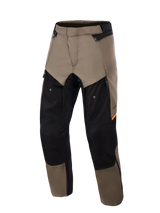 Alpinestars Cusco Drystar® Pants, Walnut Black adventure motorcycle pants, front view, featuring walnut brown and black panels with orange accents, large zippered thigh ventilation, and durable textile construction.