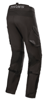 Alpinestars Halo Drystar® Pants, Adventure Touring Motorcycle Pants, Black, rear side view featuring the astars logo on the waistband, functional cargo pockets, and adjustable straps on the legs for a secure fit.