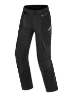 Alpinestars Stella Andes V4 Drystar® Pants, Women's Adventure Motorcycle Pants, Black, front view showing technical textile construction, white Alpinestars logo on the left thigh, cargo pockets, and ventilation zippers, durable all-weather riding gear