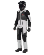 Alpinestars AMT-7 Air Jacket, White and Dark Shadow, adventure motorcycle jacket with MATRYX ventilation panels, worn with matching pants, black helmet, and gloves, full-body view of professional riding gear.