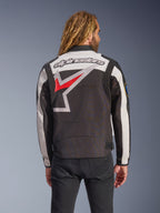Alpinestars Axton Jacket, Motorcycle Jacket, Black Off White and Bright Red, back view featuring a large wrap-around star logo and wordmark, vintage racing-inspired design with accordion shoulder panels and waist adjusters