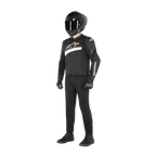 Rider wearing Alpinestars T-GP Plus R V4 Airflow Jacket in Black and White, textile motorcycle jacket with mesh panels and white Alpinestars branding, paired with a black helmet, black riding gloves, black pants, and black shoes