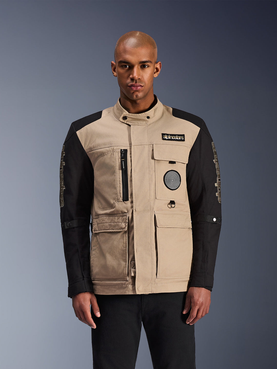 Alpinestars Dice Jacket, Motorcycle Urban Jacket, Beige and Black, Multiple Pockets and Zippers, High Collar with Button Closure, Chest Patches, Modern Design