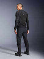 Alpinestars Troop-Air Pro Jacket, Black, technical armored air jacket shown from the back, featuring extensive mesh panels for airflow, paired with matching black technical pants and shoes.