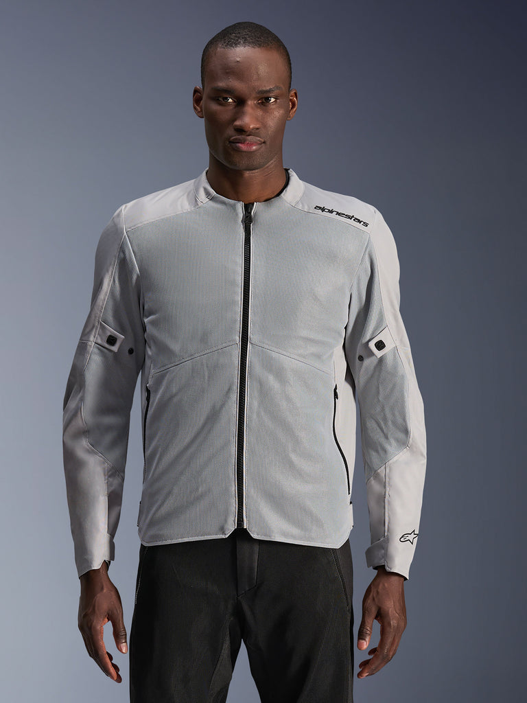 Alpinestars C-1 Air Jacket, Urban Motorcycle Jacket, Silver and Gray, featuring large tech mesh panels on the chest and sleeves, black central zipper, minimalist branding on the shoulder, lightweight and ventilated design for urban commuting