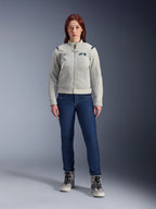 Alpinestars Stella CIRCAL-1 Air Jacket, Women's Motorcycle Jacket, Metal Gray and Methyl Blue, worn with dark blue jeans and gray riding boots, featuring mesh panels for ventilation and a modern urban design