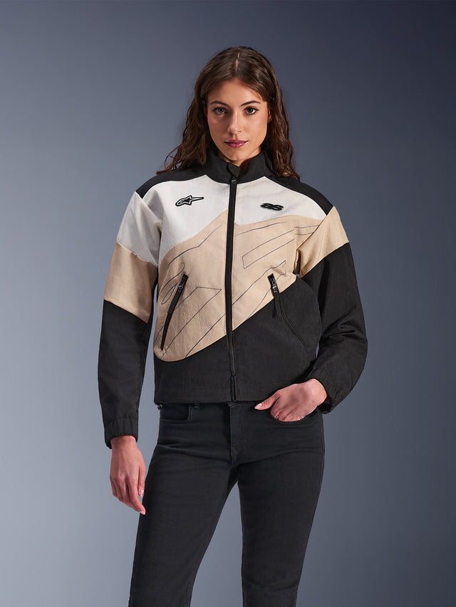 Woman Stella Moshell Jacket, Motorcycle Urban Jacket, Black White and Beige, Zigzag Pattern Design, High Collar with Front Zipper, Zippered Pockets, Alpinestars Logos on Chest