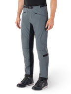 Alpinestars Alden Pants, Urban Gray and Black motorcycle pants, streetwear-inspired textile riding pants with 3-layer stretch softshell, black inner leg panels, built-in waist belt, slim fit below the knee, worn with black riding shoes