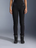 Alpinestars Womens Banshee Leggings, Black motorcycle pants, slim-fit design with accordion knee panels, worn with black high-top riding boots, urban road gear with a casual style