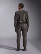 Alpinestars GP Race V3 Suit FIA, Rear View, Black and Silver, professional auto racing suit featuring two-layer aramidic construction and stretch panels, worn with matching racing gloves and boots