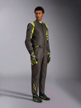 Alpinestars GP Race V3 Suit FIA, Auto Racing Suit, Black and Yellow Fluo, worn by a model with matching racing gloves and boots, featuring vibrant yellow accents on the shoulders and legs, professional motorsport gear