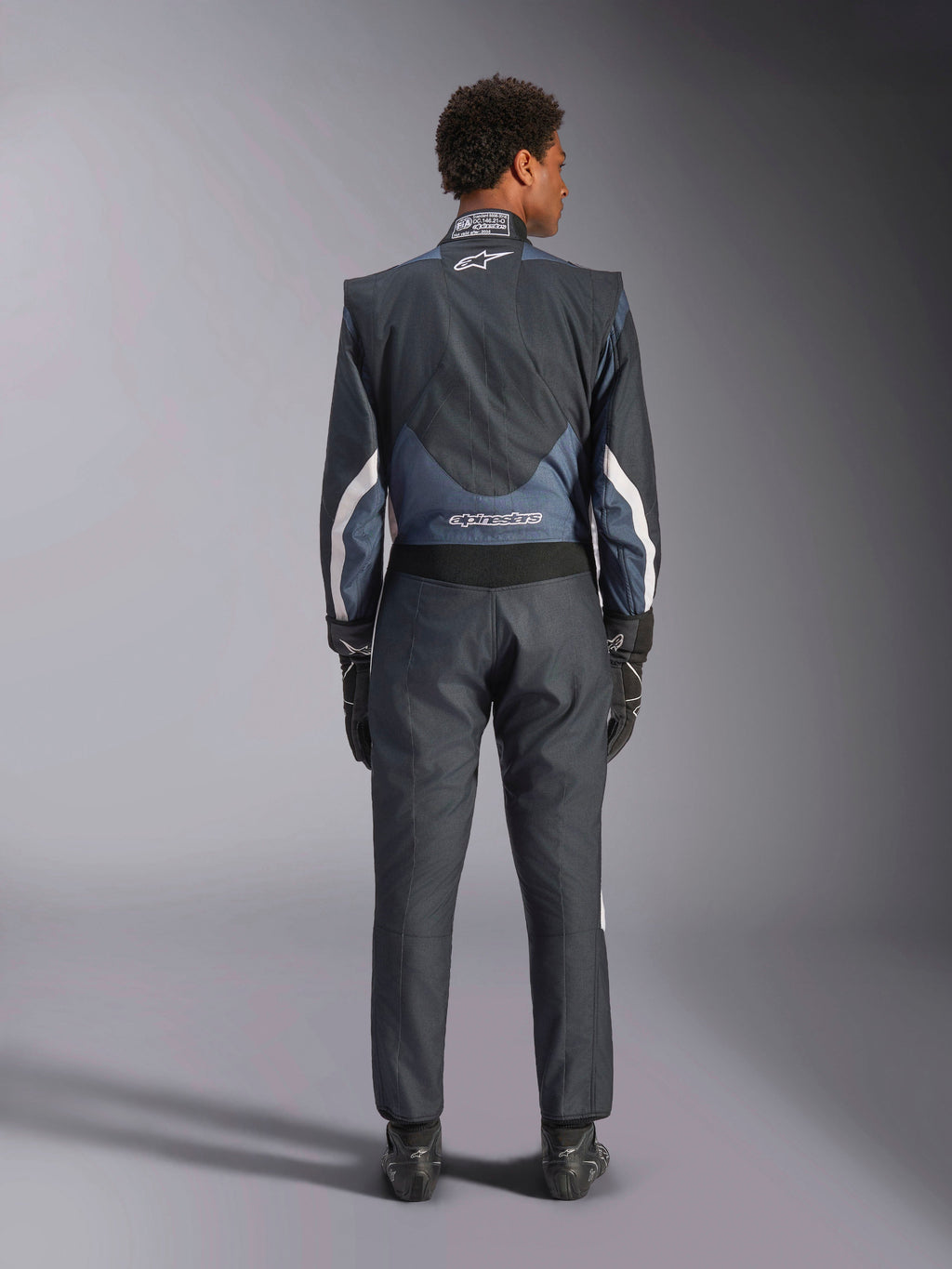 Alpinestars GP Pro Comp V2 Suit, auto racing, Men, Black and Asphalt White, fireproof aramidic, FIA certified, back view.