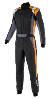 Alpinestars GP Pro Comp V2 FIA Suit, one-piece auto racing suit, Black Asphalt Orange Fluo, featuring grey side panels and bright orange vertical accents, white Alpinestars logos on shoulders and lower leg, professional motorsport design.