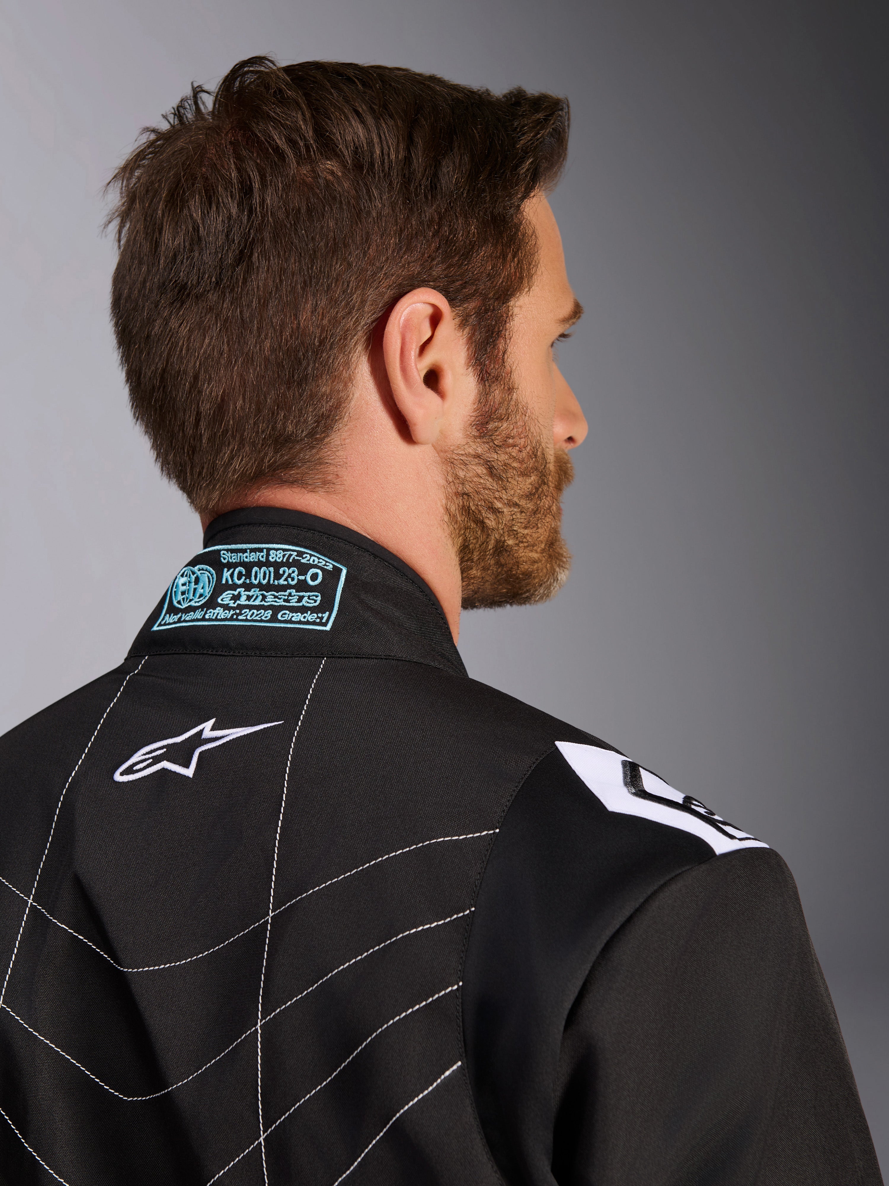 KMX-9 V3 - Black White Karting Suit | Alpinestars®