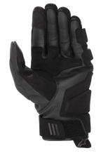 Alpinestars Phenom Leather Gloves, Motorcycle Gloves, Black, palm view featuring reinforced goat leather construction, padded landing zones, and short cuff design with adjustable wrist strap and Alpinestars logo pull tab