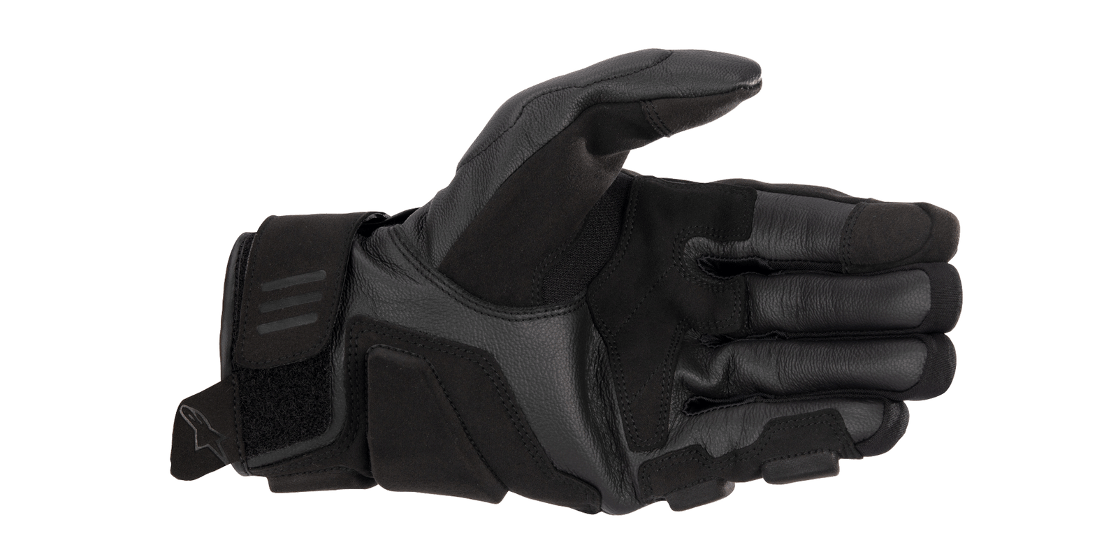 A black and white Alpinestars EU Phenom Leather Glove displaying the palm side, highlighting protective knuckle padding, perforated leather for breathability, and a Velcro strap at the wrist for a secure fit. The Alpinestars logo is visible on the side of these sport performance gloves.