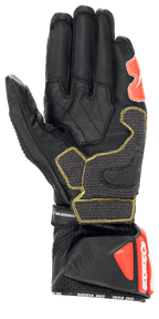 Alpinestars GP Tech V2 Gloves, Black White and Red Fluo, Palm View showing black leather construction with yellow contrast stitching, protective DFS cuff with red accents, professional racing motorcycle gear