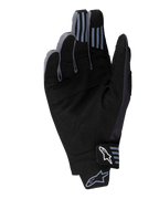 Alpinestars 2025 Techstar Gloves, Motocross Gloves, Black, palm view showing synthetic suede material with perforated details, silicone grip on fingertips, and white Alpinestars logo on the wrist closure.