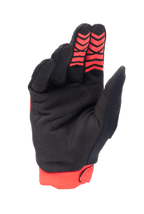 Alpinestars Honda Full Bore Gloves, Motocross Gloves, Bright Red and Black, palm view featuring synthetic suede material and red silicone grip patterns on fingertips, red stretch cuff, durable design for off-road racing