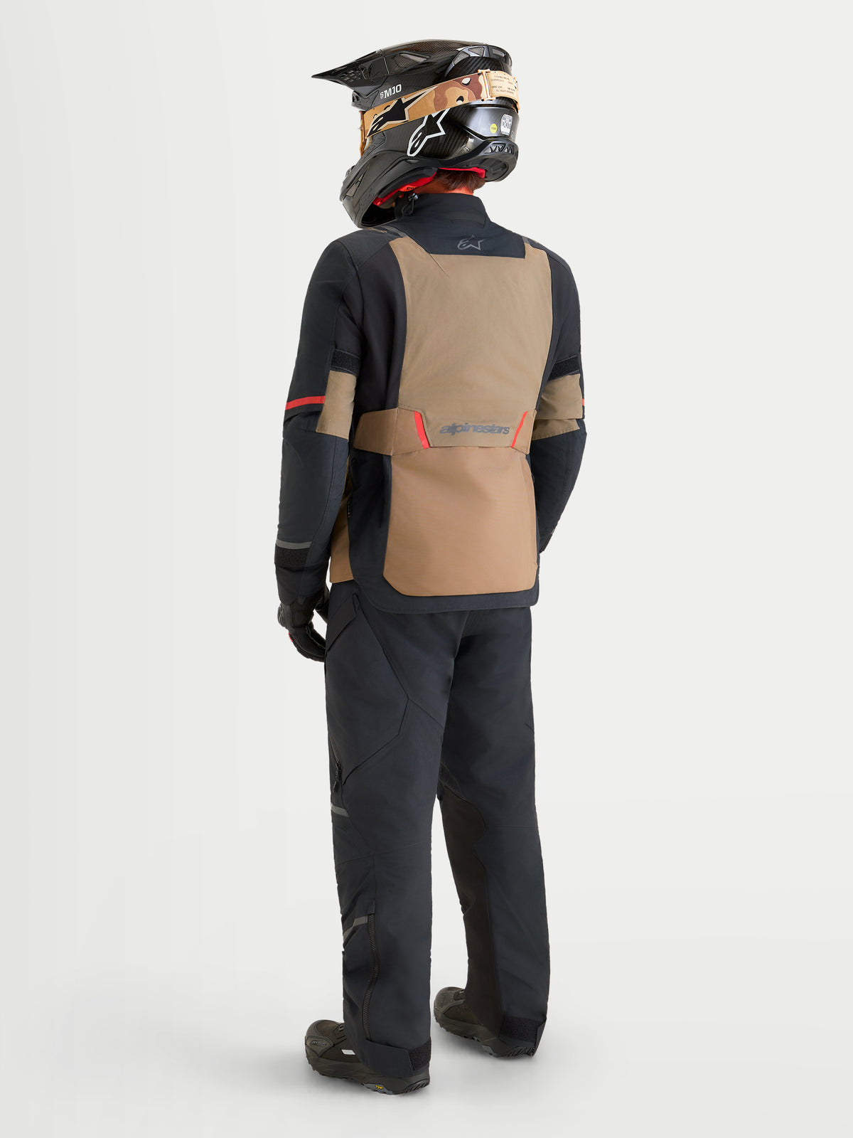 Alpinestars St-7 V2 2L Gore-Tex Jacket, Men's Adventure Touring Motorcycle Jacket, Walnut and Black, featuring a waterproof GORE-TEX shell and rear view of a rider wearing the jacket and matching gear