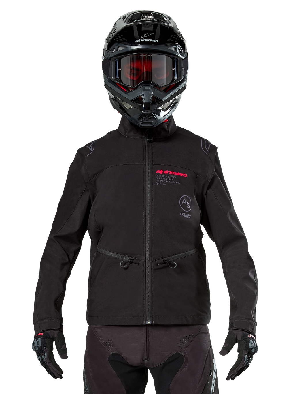 Motocross rider wearing Alpinestars Lite-Dura Softshell Jacket in Black, featuring red and grey logo details on the chest, black helmet with red-tinted goggles, black gloves and pants, front view of technical off-road riding apparel