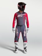 Alpinestars Supertech Hiten AFD Gear Set and Pants, professional motocross outfit in graystone and red fluo.