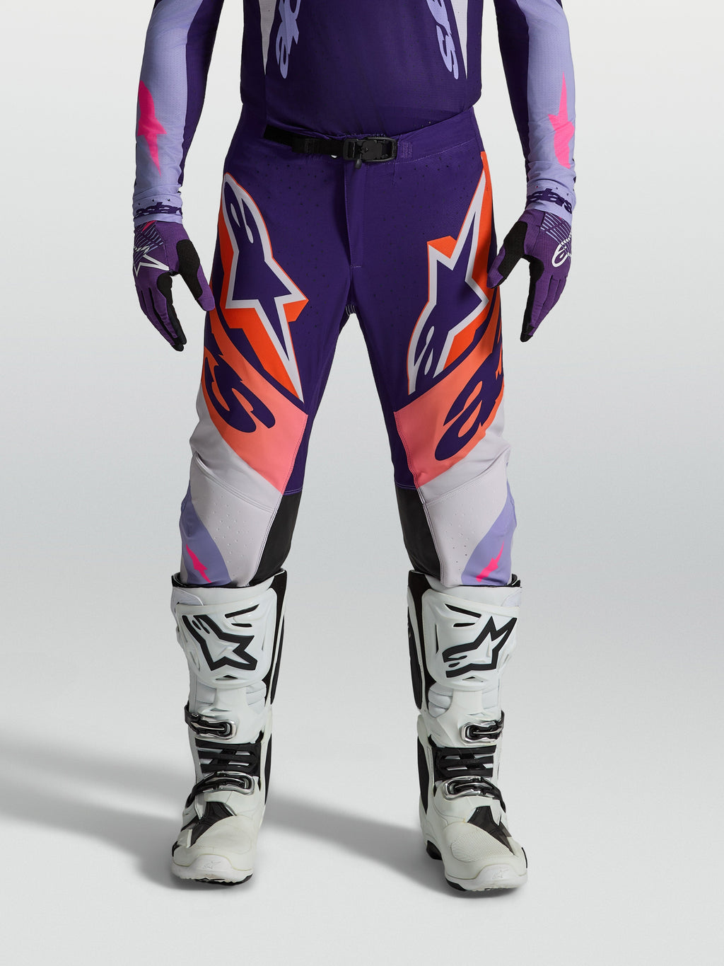 Alpinestars Supertech Dyna Pants, men's purple and pink fluo motocross pants with an athletic fit and stretch ripstop.