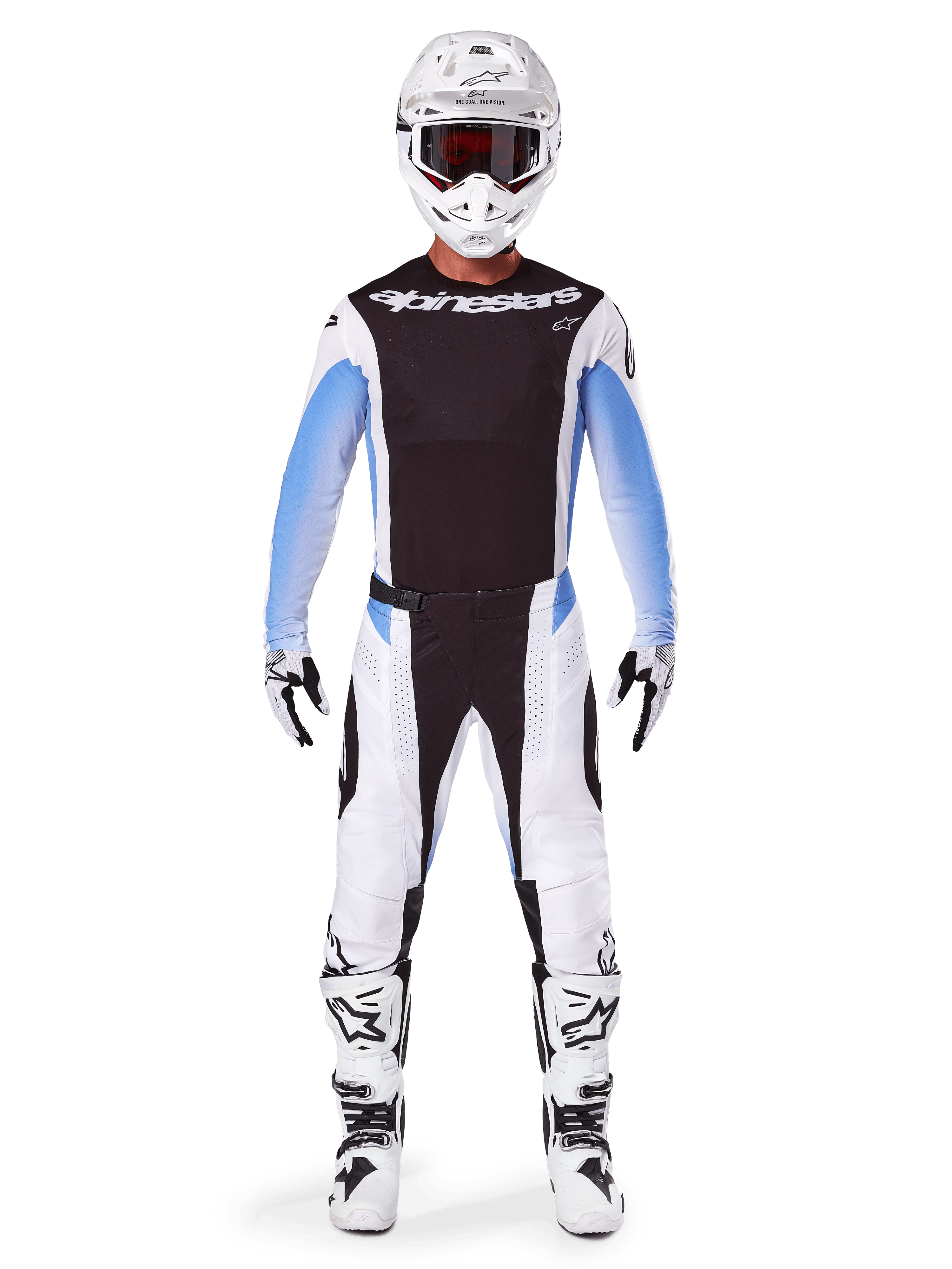 Motocross rider wearing Alpinestars 2025 Techstar Melt Pants, Motocross Pants, Black and Blue, white and black multi-panel design with blue hip accents, worn with matching white jersey, white helmet, white gloves, and boots for a complete off-road racing kit
