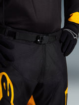 Alpinestars 2026 Racer Riway Pants, Motocross Pants, Yellow and Black, close-up of the waist area showing the SX2 auto-locking magnetic buckle and adjustable belt, durable technical fabric with yellow accents