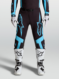 Alpinestars Supertech Vesta Pants, pro motocross racing gear, Black and Turquoise with large star graphics and leather knee panels.