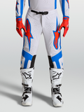 Alpinestars Supertech Vesta Pants, pro-level motocross pants in white, red and blue with athletic stretch fit and perforations.