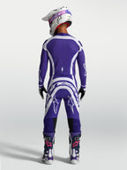 Alpinestars Supertech Vesta Pants and Jersey, Deep Blue and White motocross racing gear set shown from a rear view on model.