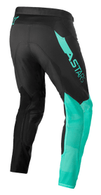 Alpinestars Supertech Blaze Pants, Motocross Pants, Black and Pastel Green, rear three-quarter view showing ASTARS branding on the thigh, breathable mesh lower legs, and stretch fabric for ergonomic performance