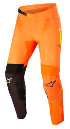 Alpinestars Supertech Blaze Pants, Motocross Racing Pants, Orange with Black and Yellow Fluo accents, featuring breathable mesh panels, reinforced 3D leather knee areas, adjustable ratchet waist belt, durable lightweight construction for off-road performance