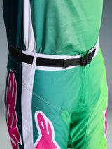 Alpinestars 2026 Racer Portl Pants, Motocross Pants, Green White and Black with Pink logo accents, close-up of the waist showing the SX2 magnetic buckle and adjustable closure, durable gear for off-road racing