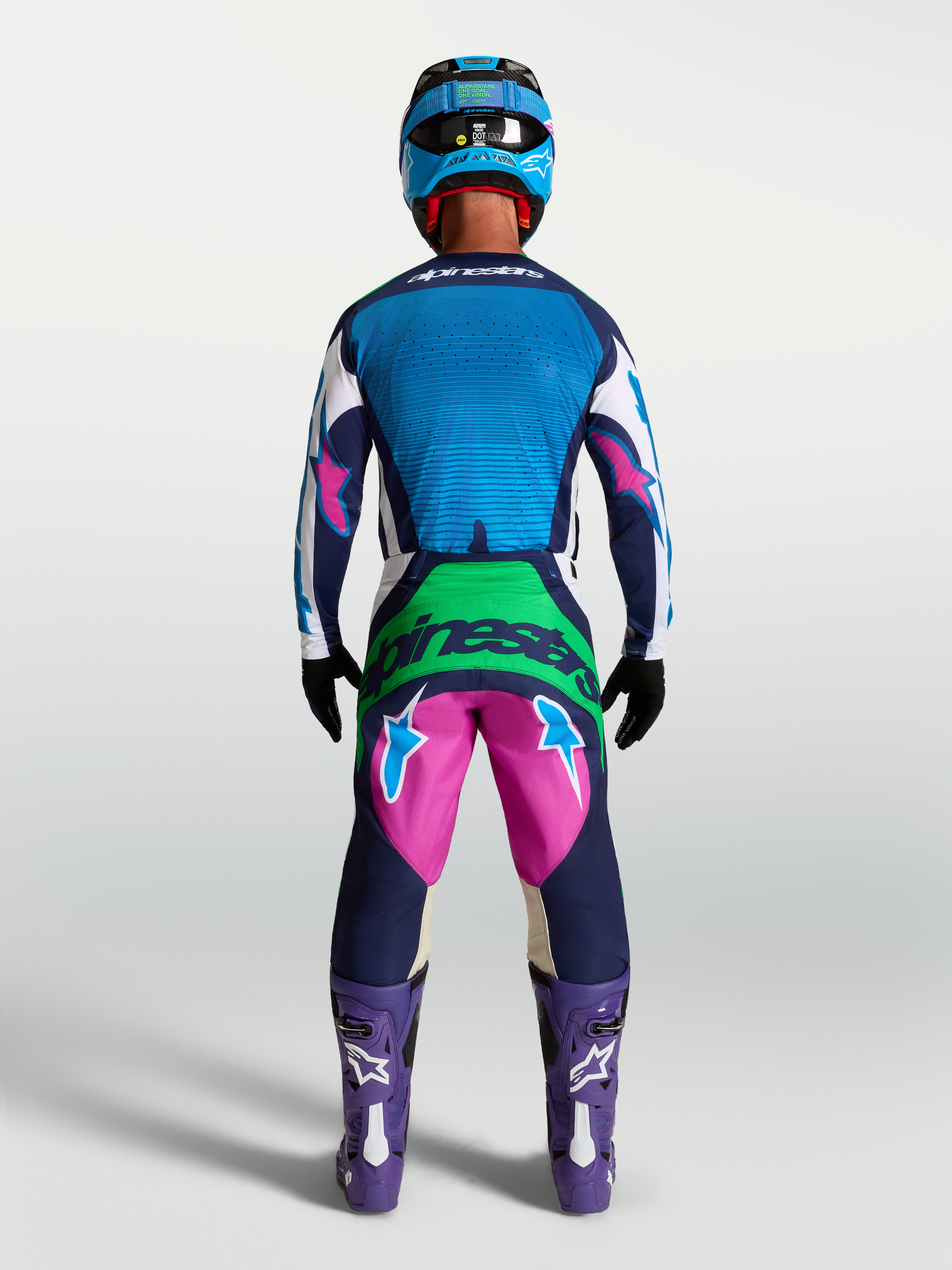 Alpinestars Techstar Maven Gear Set and Pants, Motocross Racing Outfit, Blue and Pink, Men's MX Gear, Back View on Model.